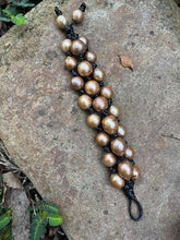 Load image into Gallery viewer, Three strand natural gold baroque fresh water pearl bracelet
