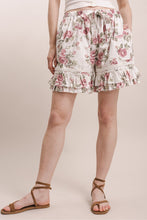Load image into Gallery viewer, Bluevelvet - FLOWER PRINT WAIST TIE RUFFLE HEM SHORTS
