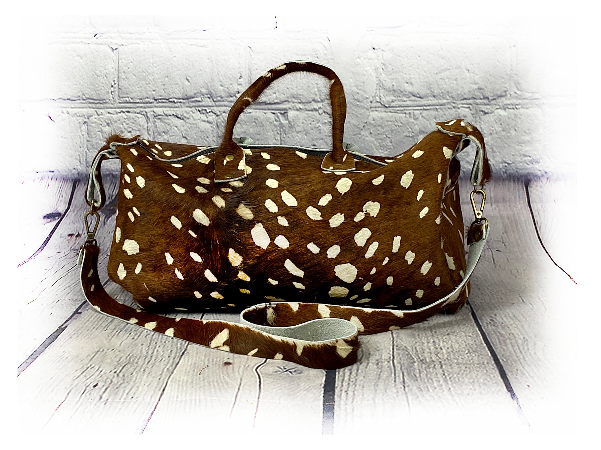 HC Repurposed LV Cowhide Duffle Bag – Shop Hannah Closet